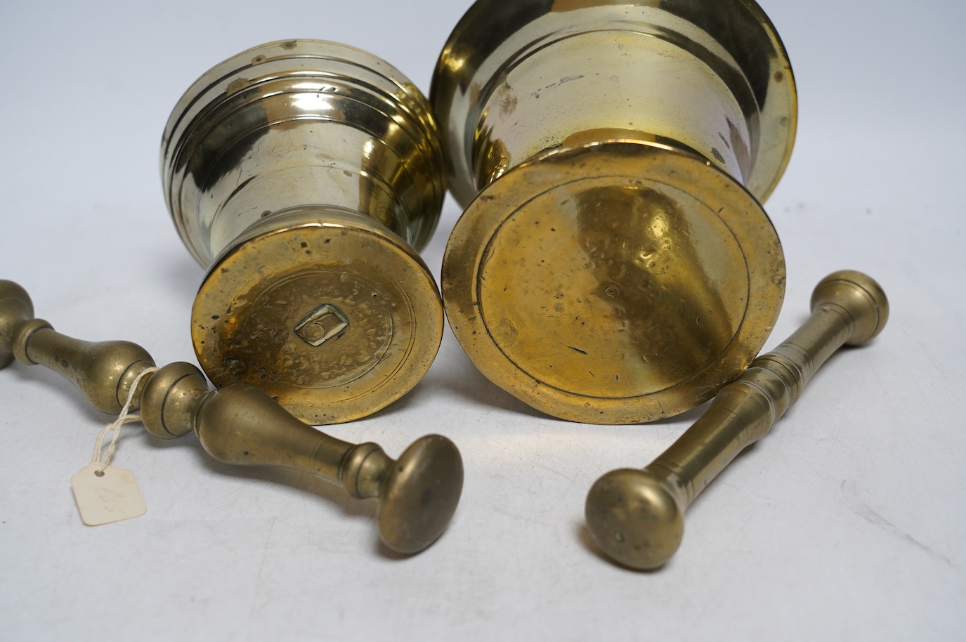 Two 19th century brass pestles and mortars. Condition - fair to good